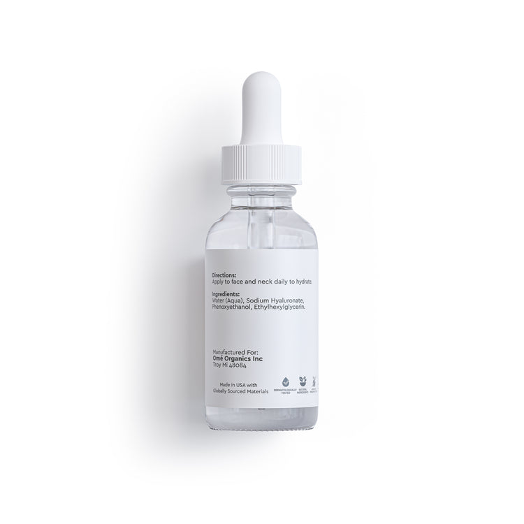 Skincare dropper bottle with white cap on a light gray background