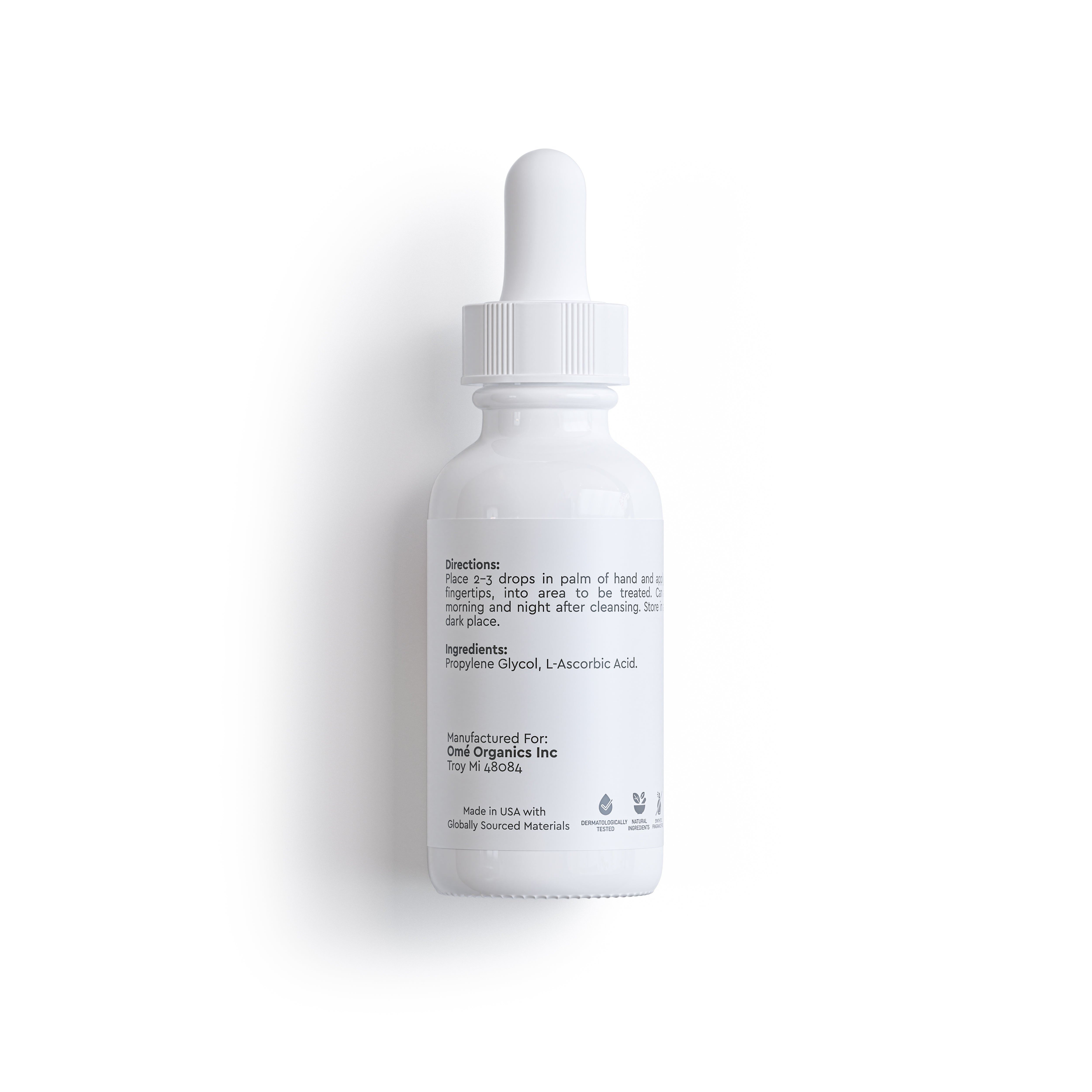 White dropper bottle with label on a white background