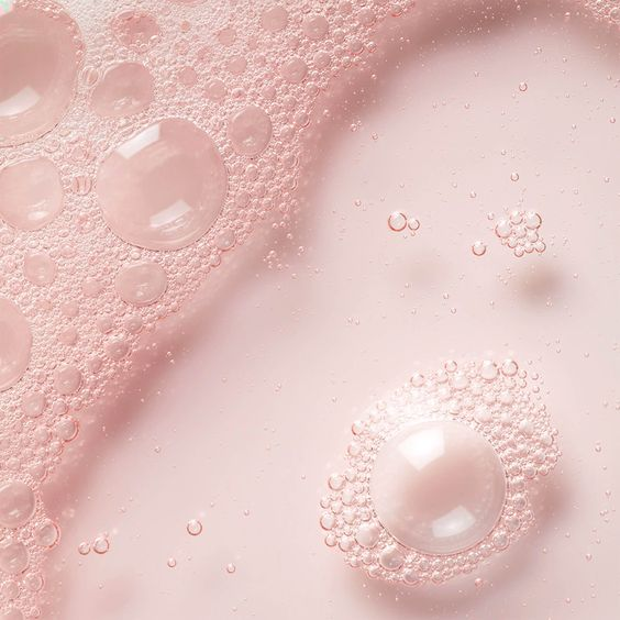 Close-up of pink bubbles on a pink background